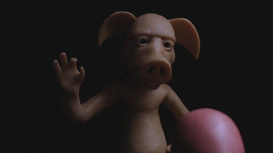 A pale pig-headed clay figure raises one hand in the dark, a pink clay form at his side.